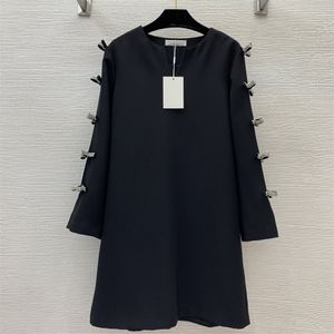 Women's dress designer dress long advanced sense early spring new bow decoration long sleeve heavy order diamond sequins