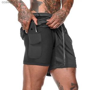Herr shorts män fitness shorts sommarsport shorts dubbel däck löpande shorts mäns falska tvådelar strandbottnar gymträning jogging kort T240105