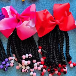 Детский плетеный хвост с розовыми бусинами и черным бантом для девочки. Хвост с аккуратными косичками 240105