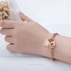 Tiffanylris Charm ot New niche design ins wind titanium womens button love stainless steel heart bracelet can be engraved