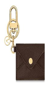 Klassisk blommedesigner nyckelring för kvinnor Luxury Leather Car Key Chain With Letter Keyrings Mini Bags Pendant Keyring Fashion Car8465129