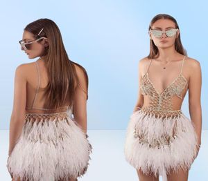 2021 Sexiga korta balklänningar spaghetti spetspärlor fjäder illusion backless mini aftonklänningar se genom formell festklänning8656887