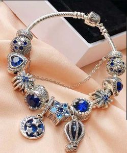 Braccialetti europei con perline blu in argento sterling 925 per donne Ala Piuma Luna Stelle Palloncino Perline di cristallo Catena del serpente Gioielli di moda 9KNL