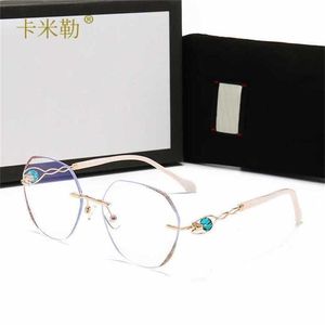 58% Wholesale of New online celebrity Tiktok fashion trend sunglasses women go shopping personality rimless cut edge glasses 811