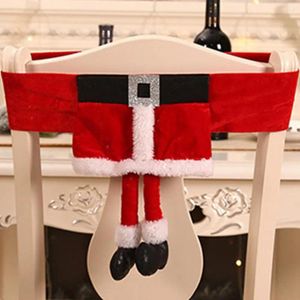 椅子はレッドサンタクロースハットクリスマスバックカバーエルフの足の食事陽気な装飾家