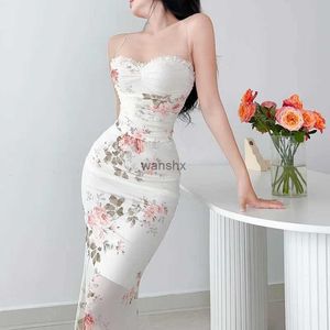 Grundläggande casual klänningar Elegant blommor tryck Suspender klänning kvinnor mode av axel rygglösa midi klänningar chic kvinnlig festklubb Vestidos YJ23300SKL240105