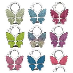 Ganci Rotaie Gancio Farfalla Borsa Appendiabiti Lucido Opaco Tavolo pieghevole per borsa Borsa all'ingrosso Fy3424 Consegna goccia Casa Giardino Casa Dhbbt