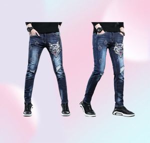 Ny 2021 varumärkesdesigner rippad manlig varghuvud broderi mager jeans män mode smala stiliga långa långa byxor38864473075