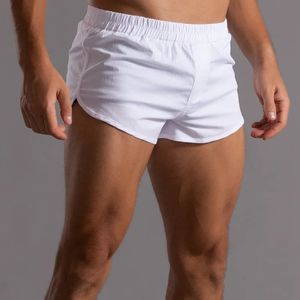 Pantaloncini da boxer in cotone da uomo Orlo arrotondato Pantaloni da notte sexy per la casa Vita elasticizzata ampia Boxer da pigiama bianco Uomo Slip da salotto leggeri 240105