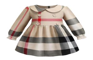 Ny amerikansk tjej bomullsklänning baby flickor klänning barn lapel college vind bowknot kort ärm veckad polo skjorta kjol barn cas6513440