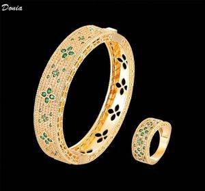 Donia Jewelry Luxury Bangle Fourleaf Flower Exaggerated Titanium Steel Bracelet Microinlaid Colored Zircon European and American3127909