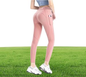 Kvinnliga leggings yoga bantar flickor gym jogger spandex fitness sport leggins springa buffed nake side ficka persika höft tätt capris gym pant set4313637