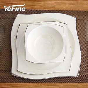 Ställer in Yefine Advanced Bone Porcelain Table Set fyrkantiga middagsplattor Rätter av hög kvalitet Vit keramiska middagar Set Soup Bowls Y20