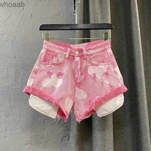 Kobiety szorty HDSPQ Y2K Pink Denim Shorts Women 2023 Summer Ripped Hole Dżinsy Women Lose Linia szerokie LGE Hot Pants Ogabersa YQ240108