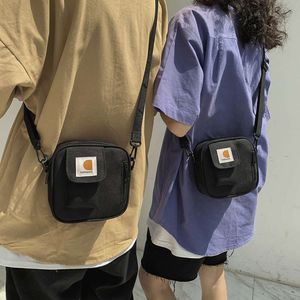 Bolsa de ombro de marca moderna para homens, bolsa de ombro pequena moderna e esportiva para roupas de trabalho hip-hop femininas, bolsa pendurada, bolsa crossbody