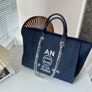 Designer lyxväska Sandbeach märke kvinnor handväskor duk multi färg vävd shopping kosmetisk väska äkta läder crossbody messager handväska av varumärke y022 003