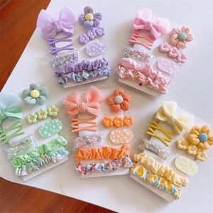 Accessori per capelli Versione coreana di fiocco in tessuto primaverile per bambini Forcina per ragazze Cartone animato floreale Anello per intestino crasso Set da 9 pezzi All'ingrosso