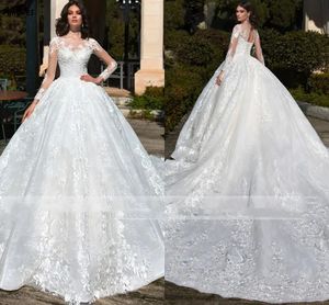 Abiti da sposa con applicazioni di pizzo arabo Dubai Ball Gown con maniche lunghe Collo trasparente Principessa Abiti da sposa formali Donna Plus Size Corte dei treni Abiti da sposa CL3175