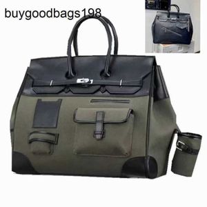 Designer saco bolsas artesanais 7a carga grande capacidade de couro genuíno platina 2024 nova moda das mulheres dos homens sacos viagem lona 7r3y