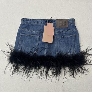 Feather Fur Patchwork Designer denim kjol kvinnor blå minikjolar klänning sexiga lyxiga jean kjolar