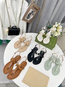 Toppdesigner flip-flop sandaler 5 färger med guldspänne platt klackar kvinnors vårsko bakre rem verklig läder fast alla matchar bekväm storlek 35-43