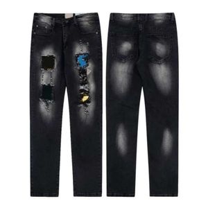 Män byxor designer skjorta brev tryck lång hylsa skjortor byxor kvinnliga svettbyxor fläckiga par lösa mångsidiga raka casual high street jeans w23f