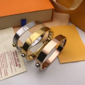 Designer Lettera V Bracciale rigido in oro rosa Argento Acciaio inossidabile Lusso Semplice modello incrociato Fibbia Gioielli firmati per donna Donna Uomo Uomo Bracciali Marchio