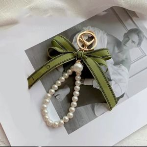 keychain designer keychain luxury keychain charm female car key ring Pearl charm green ribbon delicate shells keychain couple pendant gift