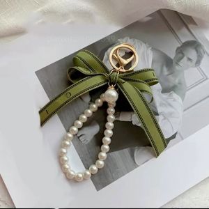 Keychain Designer Keychain Luxury Keychain Charm Female Car Key Ring Pearl Charm Green Ribbon Delicate Shells Keychain Par Pendant Gift