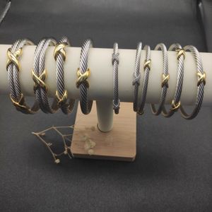 DY X Bracciale rigido per donna Cavo stazione di alta qualità Croce Designer di lusso Bracciale intrecciato premium squisito Colore oro argento Braccialetti di moda Gioielli