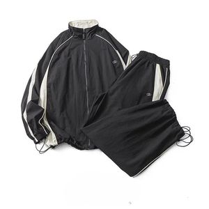 Amerikansk retro svartvit skarvningsjacka för män kvinnor casual sport japansk stil stativ krage bf 240109