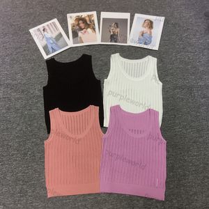 女性ニットベストファッションデザイナーホロータンクトップ弾性ニットノースリーブセクシープルオーバー4カラーTシャツ