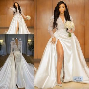 Illusion Pearls Crystal Country Wedding Suknie 2024 African Long Rleeve Side Split Arabic Satin Church Garden Reception Suknie Robe de Mariee