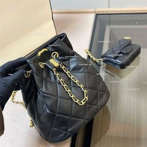 Сумка роскошные бренды дизайнерские рюкзак для женщин для женщин с овчиной сеть женская Duma 23p rucksack 2024 Металлическая пряжка мода мини -сумки