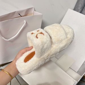 Pälsdesigner Mules Sandaler Kvinnor Wool Shearling Winter Warm Comfort Slide på Australien Hemskor Tyg Fluffiga lyxiga tofflor