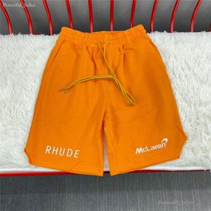 Rhude 반바지 디자이너 남성 남성 Mens 드로우 스트링 액티브 바지 여름 패션 해변 블루 레드 블랙 스트리트 러닝 스포츠 조깅 짧은 4802