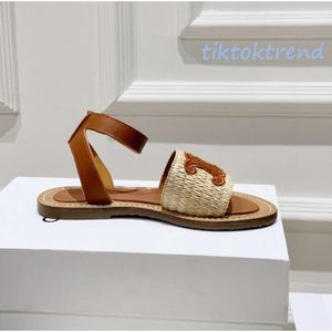 Lympia Flat Slides Raffia Sandals Triomphe محظورة حزام الكاحل المفتوح المصمم الفاخر للنساء شقق العطلة المصارع المصنع صندل حجم 35-42