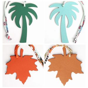 Dubbel ansikten Silkband Full verklig äkta läderpalm Tree Maple Leaf Keychain Key Chain Women Bag Charm Backsack Pendant 240110