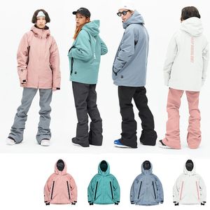 Inverno esqui desgaste moda rosa ternos de esqui para homens e mulheres mantendo quente e frio jaqueta de esqui impermeável snowboard casaco multicolorido 240111