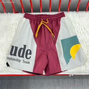 Rhude 반바지 디자이너 남성 남성 Mens 드로우 스트링 액티브 팬츠 여름 패션 해변 블루 레드 블랙 스트리트 러닝 스포츠 조깅 짧은 7106