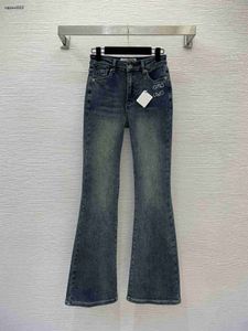 jeans da donna firmati abbigliamento di marca da donna Targhetta in pelle con logo ricamato con tasca decorata con elastico a vita alta slim e pantaloni 11 gennaio