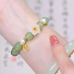 Bangles UMQ Natural Hotan Jade Pequena Flor de Pêssego Pulseira para Mulheres 2024 Novo Design de Nicho Elegante Luxo HandString Presente Jóias