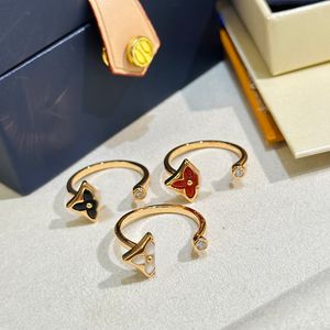 Kvinnans smyckesdesigner Luxury S925 Sterling Silver justerbar ring från klassisk blommig röd vit svart plätering 1,0 tjock guld mode flicka charm emotionell gåva
