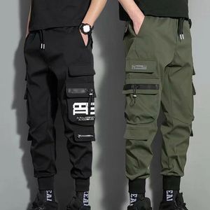 Hip Hop Joggers Spodnie Cargo Men Harem Spodnie swobodne multi-kockets Spodnie Czarne zielone spodnie dresowe strejowe presie Men Pants 240111