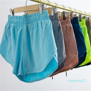 Lu lulemen Nuovi pantaloncini fitness da donna con lacci antiriflesso e tasche multiple per correre pantaloni da yoga casual ad asciugatura rapida che assorbono il sudore