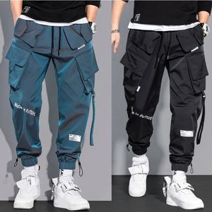 Tunn streetwear casual byxor män band harem jogging byxor manliga smala fit fjäderlastbyxor multi-fickor kvinnor byxor K12 240111