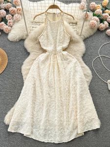 Casual klänningar kvinnor strandklänning sommar hängande nacke sexig ihålig midja exponerad jacquard smal eleganta damer vintage lång mantel