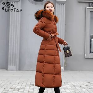 UHYTGF Winter Jacket Women's Warm Parkas Fashion Bow Belt Fox Fur Collar Long Coat Women's Oversize Vintage Thick Coat 1050 240112