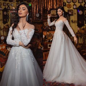 Elegante abito da sposa in pizzo A Line Sweetheart a maniche lunghe Abiti da sposa Corte dei treni Applique Robe De Soiree