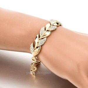 Legering inlagd med diamanter fashionabla smycken bladarmband kvinnliga efternamn guld tillbehör blad armband 42 620